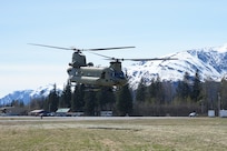 A CH-47 Chinook helicopter from 1st Battalion, 207th Aviation Regiment, Alaska Army National Guard, departs the city of Seward, Alaska, May 18, after transporting the 82nd Civil Support Team from the South Dakota National Guard in support of Exercise ORCA 21. ORCA is a chemical, biological, radioactive, nuclear threats response exercise designed for participants to provide support in the aftermath of hazardous materials incidents. ORCA tests interoperability between agencies, increases opportunities for working relationships, and practices requests for assistance methods. Approximately 250 National Guardsmen from CST units in Alaska, California, Connecticut, Colorado, Idaho, Ohio, Oregon, Rhode Island, South Carolina, South Dakota, Washington, and Wisconsin are in Alaska to participate in Exercise ORCA 2021. Numerous support units and civilian agencies participated in the exercise as well. (U.S. Army National Guard photo by Dana Rosso)