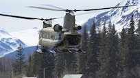 A CH-47 Chinook helicopter from 1st Battalion, 207th Aviation Regiment, Alaska Army National Guard, prepares to land in the city of Seward, Alaska, May 18, in support of Exercise ORCA 21. The CH-47 inserted the 82nd Civil Support Team from the South Dakota National Guard into Seward as the initial response team responsible for conducting a scene assessment, establishing the staging areas as well as the on-scene command post. The 82nd CST also conducted the initial entry into the incident location. ORCA is a chemical, biological, radioactive, nuclear threats response exercise designed for participants to provide support in the aftermath of hazardous materials incidents. ORCA tests interoperability between agencies, increases opportunities for working relationships, and practices requests for assistance methods. Approximately 250 National Guardsmen from CST units in Alaska, California, Connecticut, Colorado, Idaho, Ohio, Oregon, Rhode Island, South Carolina, South Dakota, Washington, and Wisconsin are in Alaska to participate in Exercise ORCA 2021. Numerous support units and civilian agencies participated in the exercise as well. (U.S. Army National Guard photo by Dana Rosso)