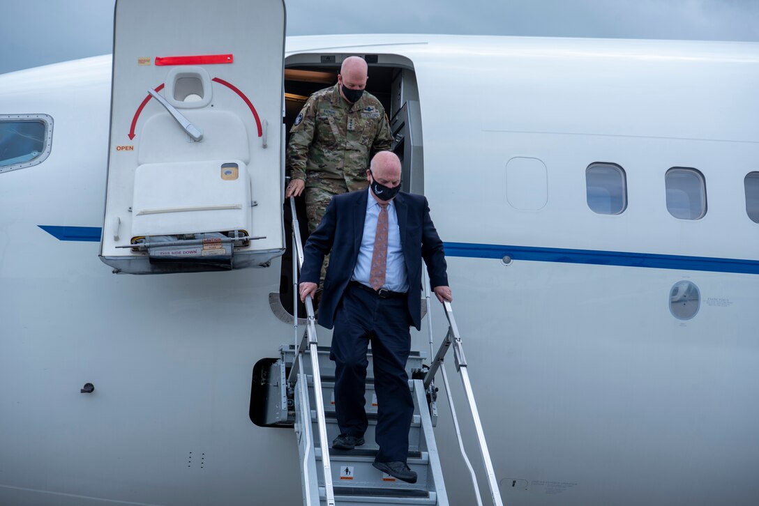 Acting Secretary of the Air Force John P. Roth, and U.S. Space Force Gen. John W. “Jay” Raymond, Chief of Space Operations, exit their aircraft after landing at Cape Canaveral Space Force Station, Fla., May 17, 2021. Roth and Raymond visited the installation to meet with Airmen and Guardians supporting space launch operations and learn more about the partnerships between CCSFS and commercial companies. (U.S. Space Force photo by Tech. Sgt. James Hodgman)