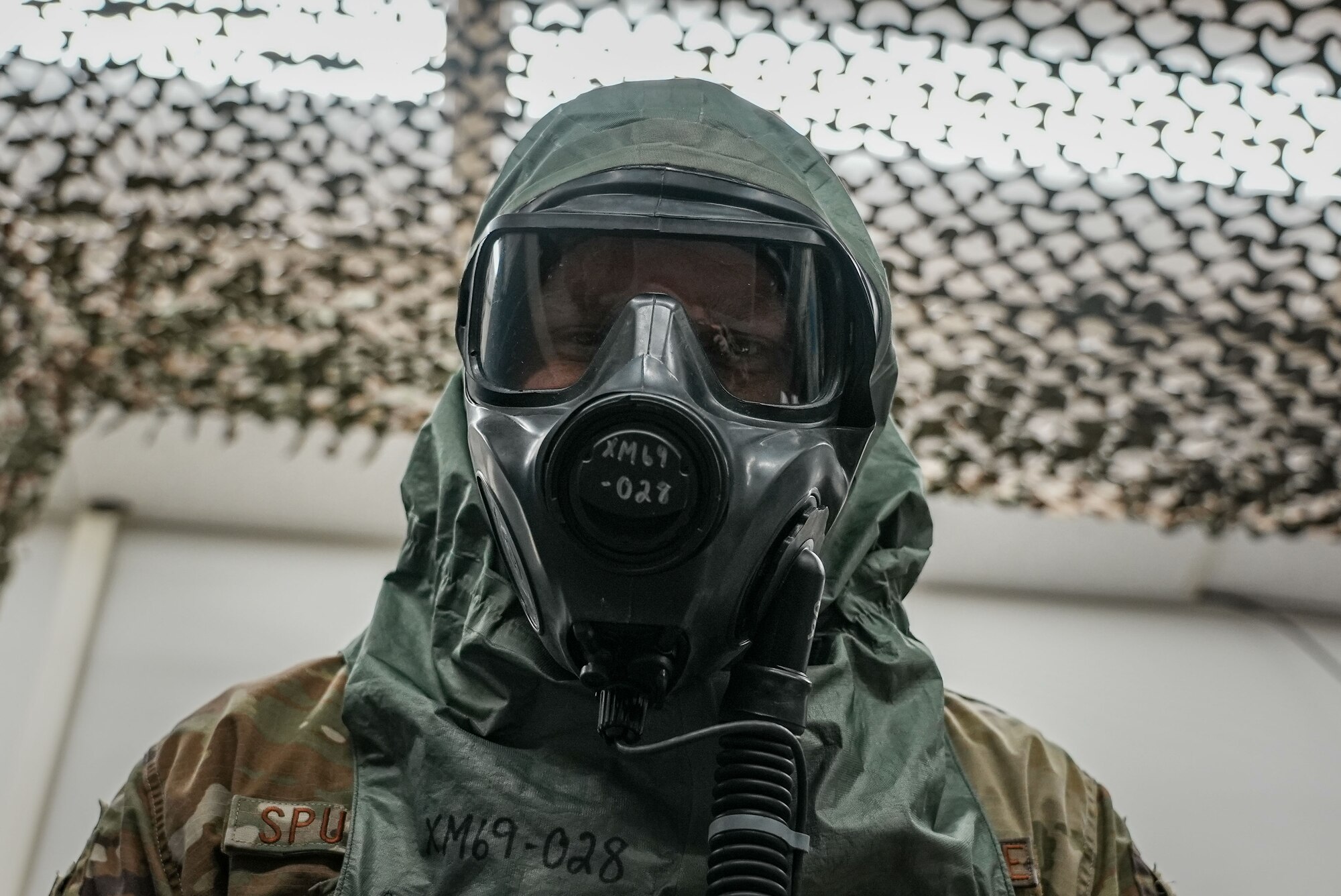 Airman wears protective face mask.