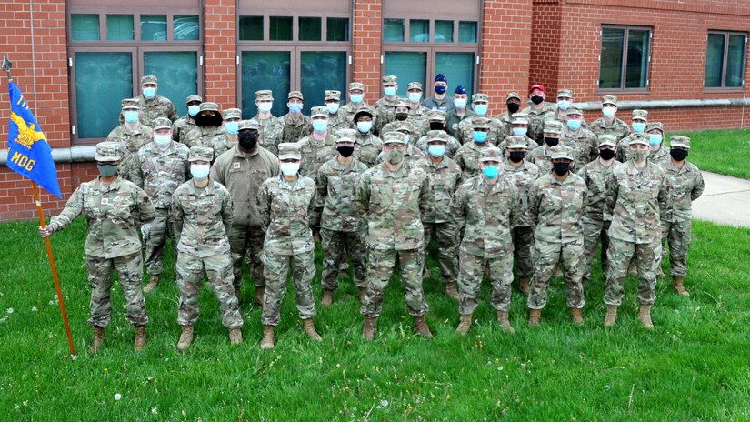 Members of the 111th Medical Group here pose for a photo at Biddle Air National Guard Base in Horsham, Pennsylvania, May 1, 2021. The 111th Med Group has administered 913 total doses of COVID-19 vaccinations on base from Jan. 27, 2021 to May 20, 2021 while also meeting high operational readiness standards despite the global pandemic. (U.S. Air National Guard photo by Tech. Sgt. Tyrone Mitchell)
