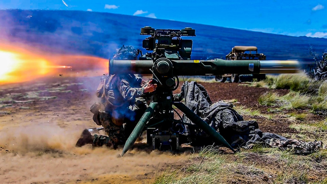 A U.S. Marine with 1st Battalion, 3rd Marines, fires a TOW missile during exercise Bougainville II at Pohakuloa Training Area, Hawaii, April 18, 2021. Bougainville II is the second phase of pre-deployment training conducted by the battalion designed to increase combat readiness through complex and realistic live-fire training.