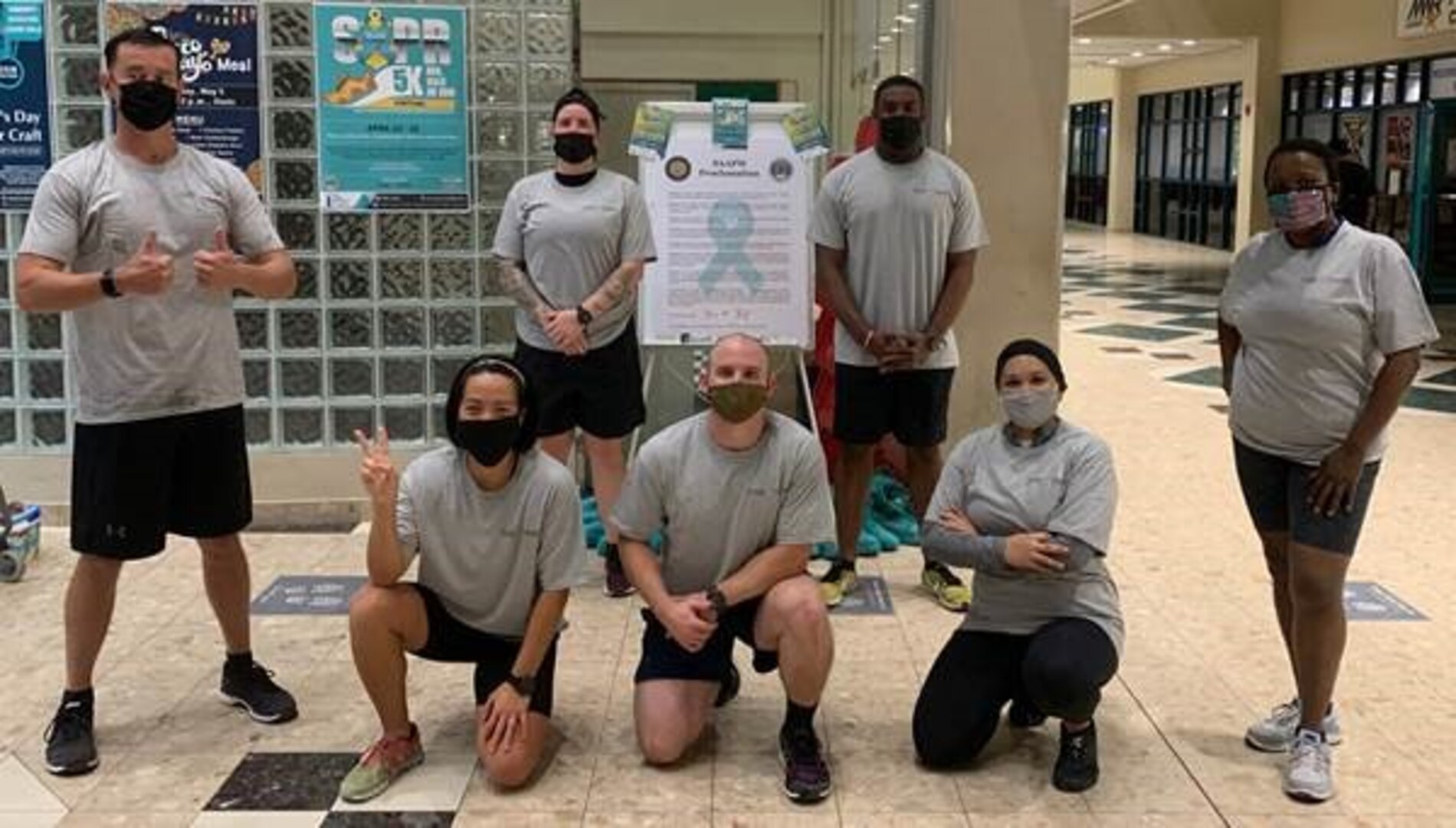 Three men and four women participated in a Naval Support Activity Bahrain run.