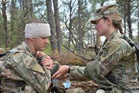 Soldiers test for Expert Field Medical Badge at Fort McCoy