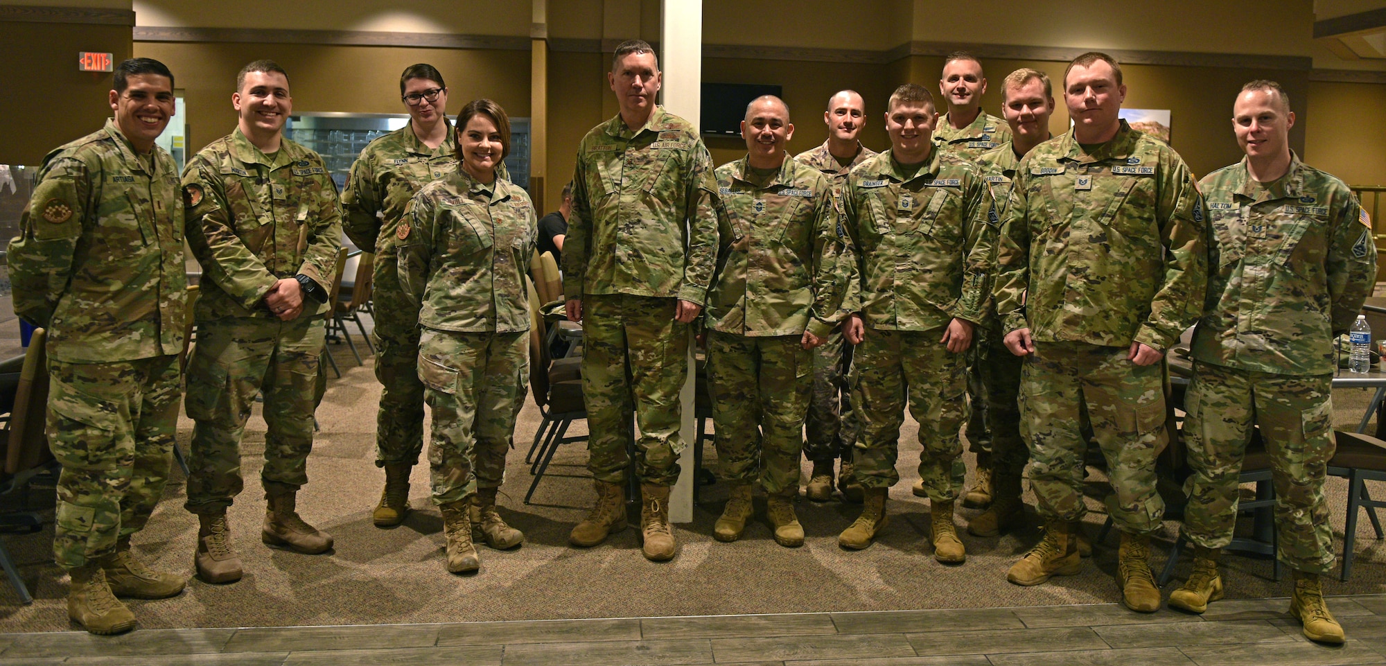 U.S. Air Force Brig. Gen. Shawn Bratton, Space Training and Readiness Command Task Force planning lead, U.S. Space Force, stands with Guardians assigned to Goodfellow Air Force Base at the Western Winds Dining Facility on Goodfellow AFB, Texas, May 18, 2021. Bratton sat down with the Guardians and discussed their training experience and involvement in the Space Force. (U.S. Air Force photo by Senior Airman Ashley Thrash)