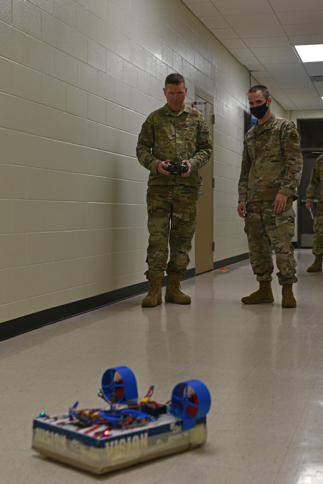 U.S. Air Force Brig. Gen. Shawn Bratton, Space Training and Readiness Command Task Force planning lead, U.S. Space Force, tests a training tool with Staff Sgt. Jonathan Bahr, 312th Training Squadron instructor, at the 312th TRS schoolhouse on Goodfellow Air Force Base, Texas, May 18, 2021. Special instruments training uses a variety of unorthodox tools both in training and operationally. (U.S. Air Force photo by Senior Airman Ashley Thrash)