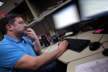 A U.S. Cyber Command, Cyber National Mission Force member works at Fort. George G. Meade Md., Feb. 24, 2021.