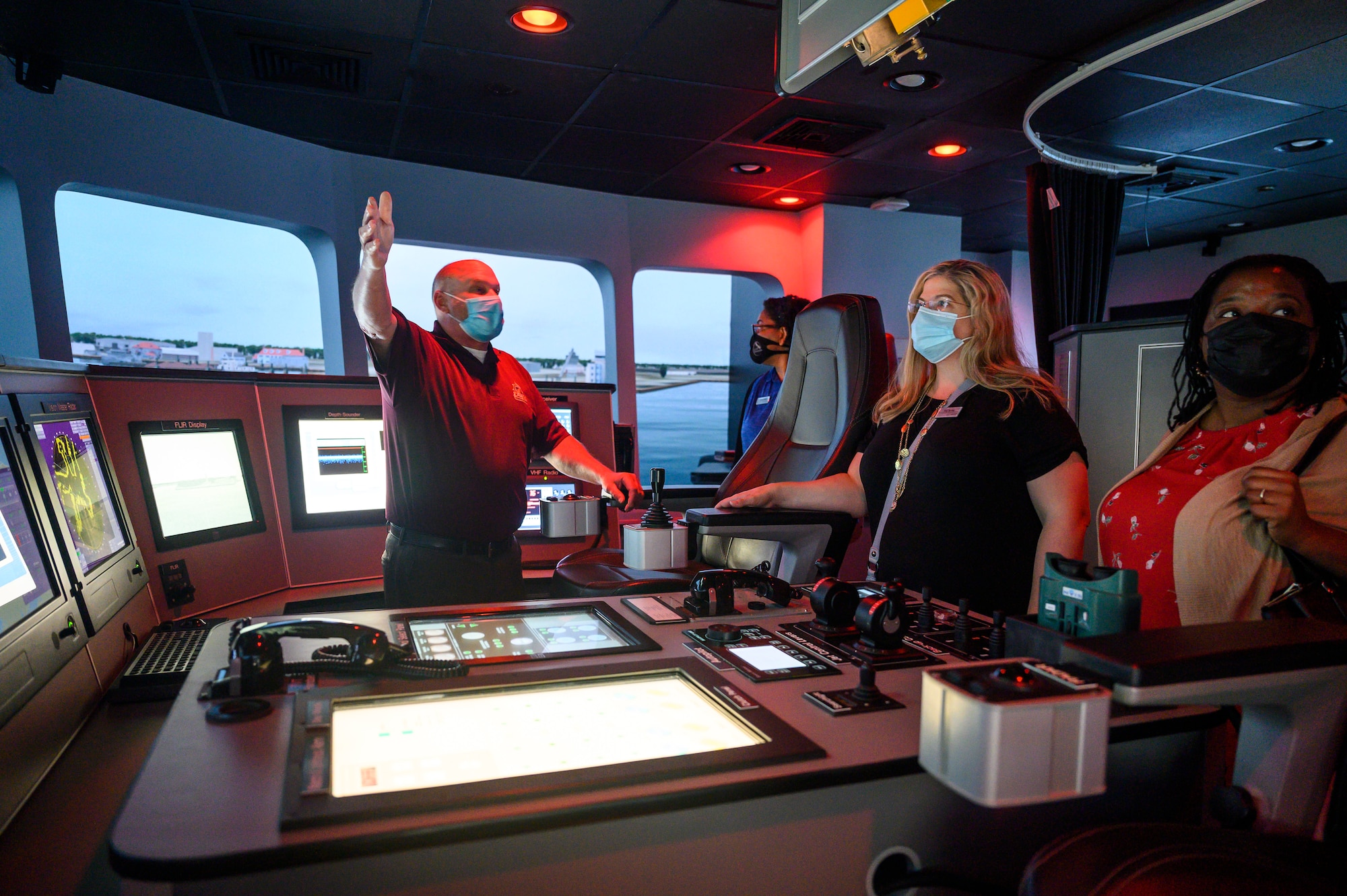 Members of the Learn, Explore, Absorb and Disseminate (LEAD) Peninsula group visit a simulation room of the U.S. Army Transportation School on Joint Base Langley-Eustis, May 20, 2021. The LEAD program participants visited JBLE to immerse themselves in the various functions and learn the role JBLE plays within the Virginia Peninsula community.