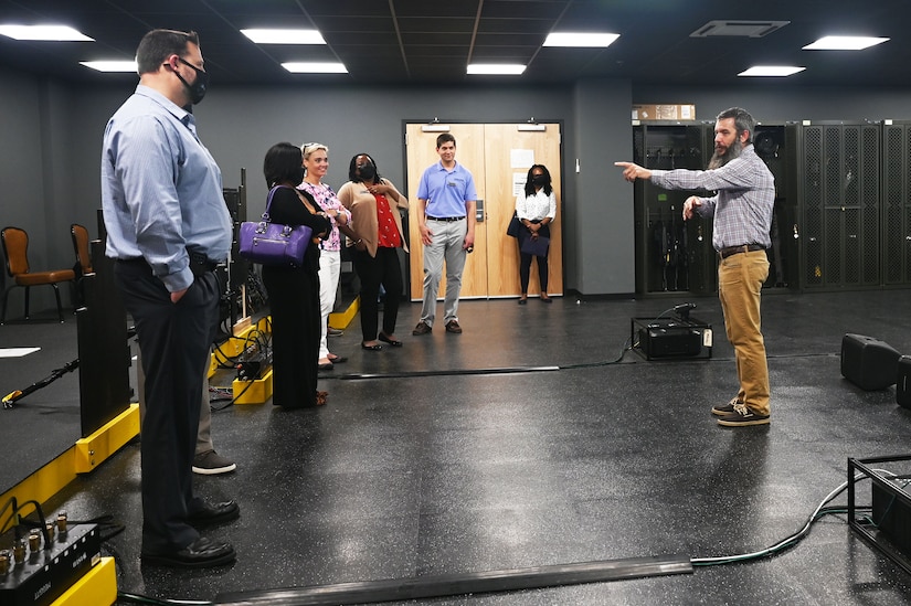 Members of the Learn, Explore, Absorb and Disseminate (LEAD) Peninsula group visit an engagement skills simulation center on Joint Base Langley-Eustis, May 20, 2021. According to the VPC website, LEAD Peninsula is a community program that stresses the importance of private, public and nonprofit sectors of the region by providing community leaders the opportunity to interface with one another.