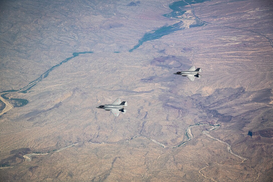 U.S. Air Force and Royal Danish Air Force F-35A Lightning II fighter jets assigned to the 308th Fighter Squadron, Luke Air Force Base, Arizona, fly in formation May 5, 2021, over Bagdad, Arizona.