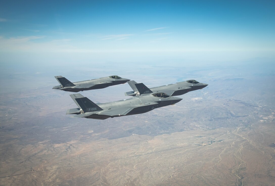 U.S. Air Force, Royal Danish Air Force and Royal Netherlands Air Force F-35A Lightning II fighter jets assigned to the 308th Fighter Squadron, Luke Air Force Base, Arizona, fly in formation May 5, 2021, over Bagdad, Arizona.