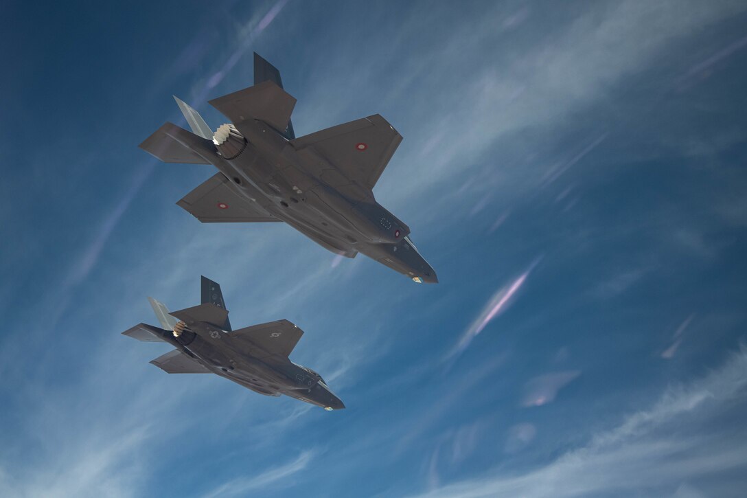 U.S. Air Force and Royal Danish Air Force F-35A Lightning II fighter jets assigned to the 308th Fighter Squadron, Luke Air Force Base, Arizona, fly in formation May 5, 2021, over Bagdad, Arizona.