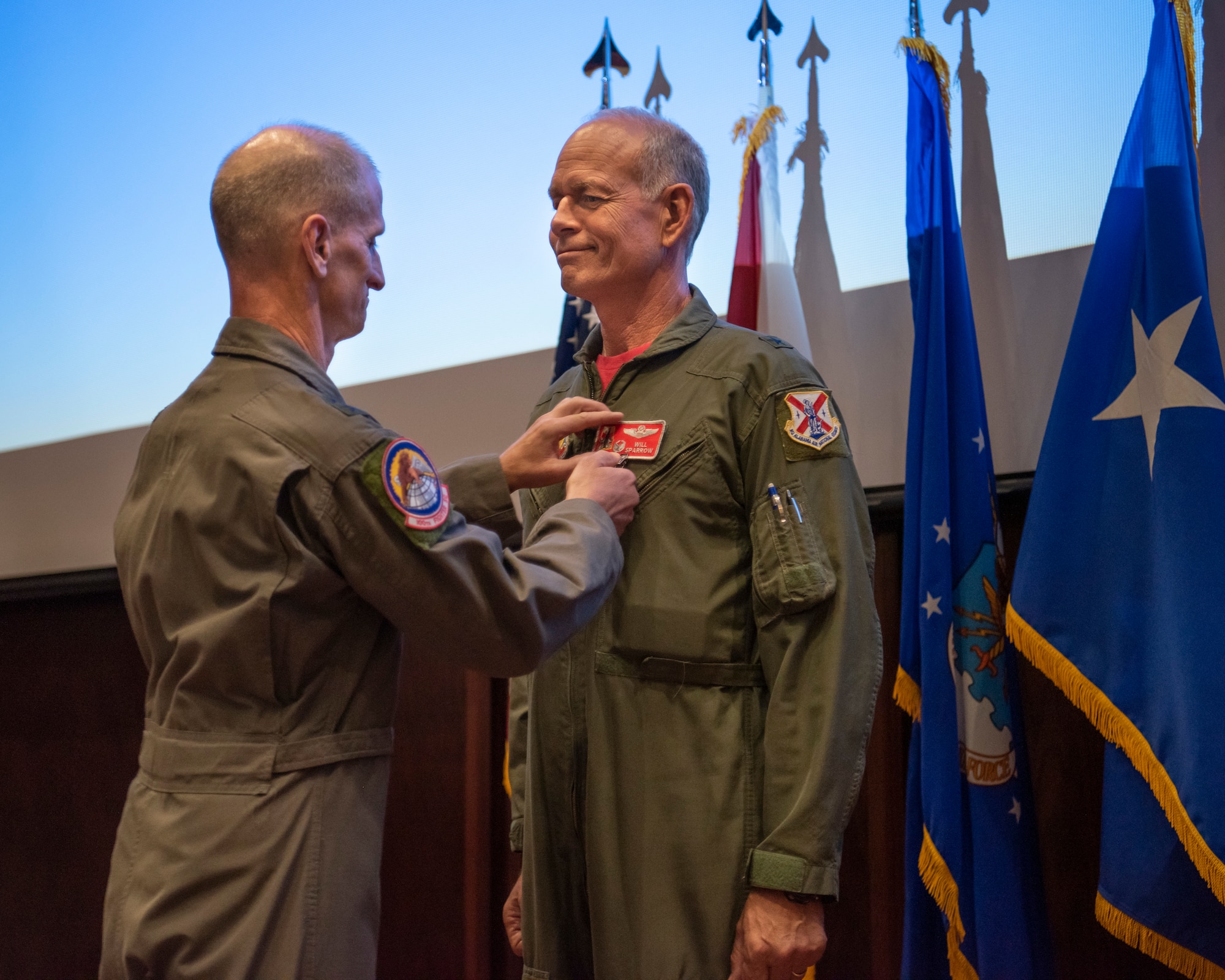Brig. Gen. William Sparrow, Alabama National Guard Assistant Adjutant General - Air, receives the Distinguished Service Medal of Alabama from Maj. Gen. Randall K. Efferson, Air National Guard Assistant to the Commander, U.S. Air Forces Central Command, at a retirement ceremony May 15, 2021, at Dannelly Field, Ala. Sparrow retired with over 36 years of military service to his state and nation. (U.S. Air National Guard photo by Staff Sgt. Hayden Johnson)