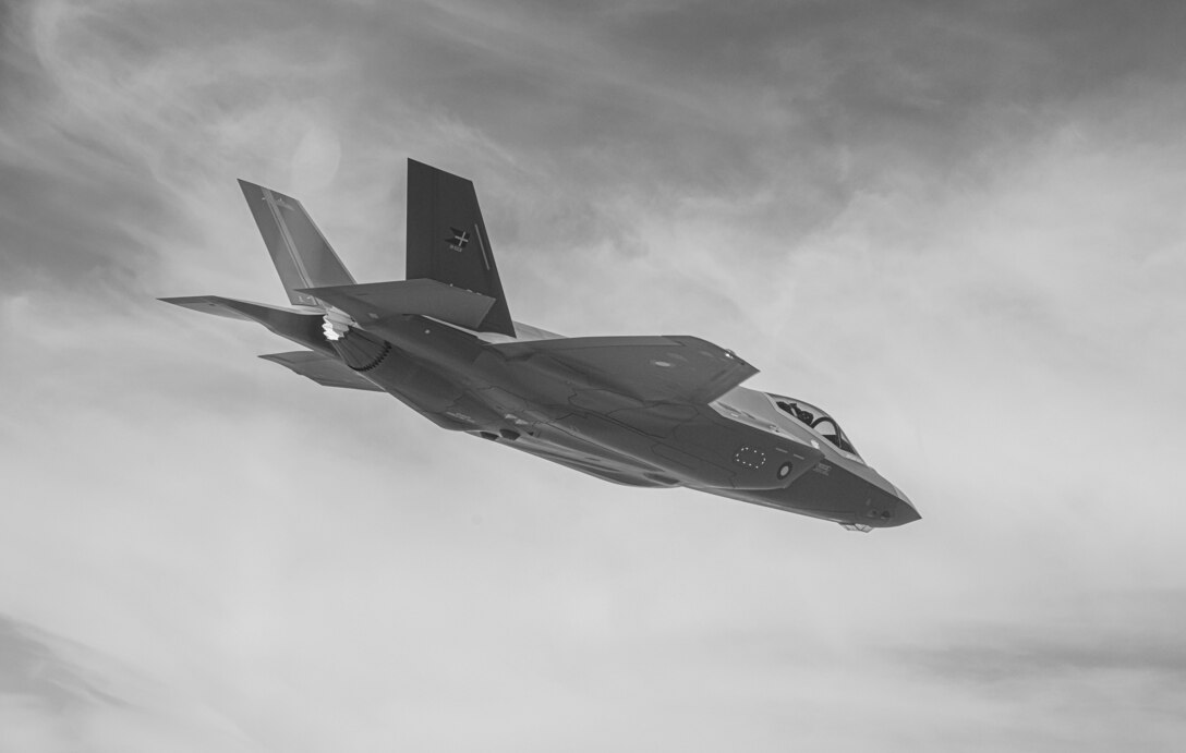 A Royal Danish Air Force F-35A Lightning II fighter jet assigned to the 308th Fighter Squadron,  Luke Air Force Base, Arizona, soars over Bagdad, Arizona, May 5, 2021.