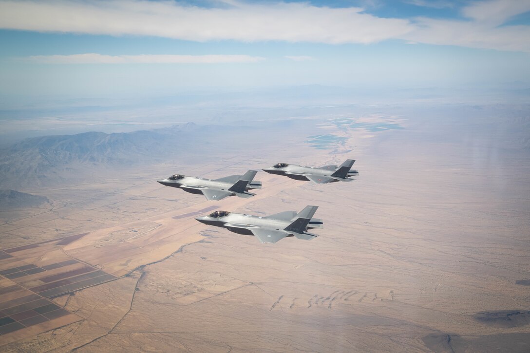 U.S. Air Force, Royal Danish Air Force and Royal Netherlands Air Force F-35A Lightning II fighter jets assigned to the 308th Fighter Squadron, Luke Air Force Base, Arizona, fly in formation May 5, 2021, over Bagdad, Arizona.