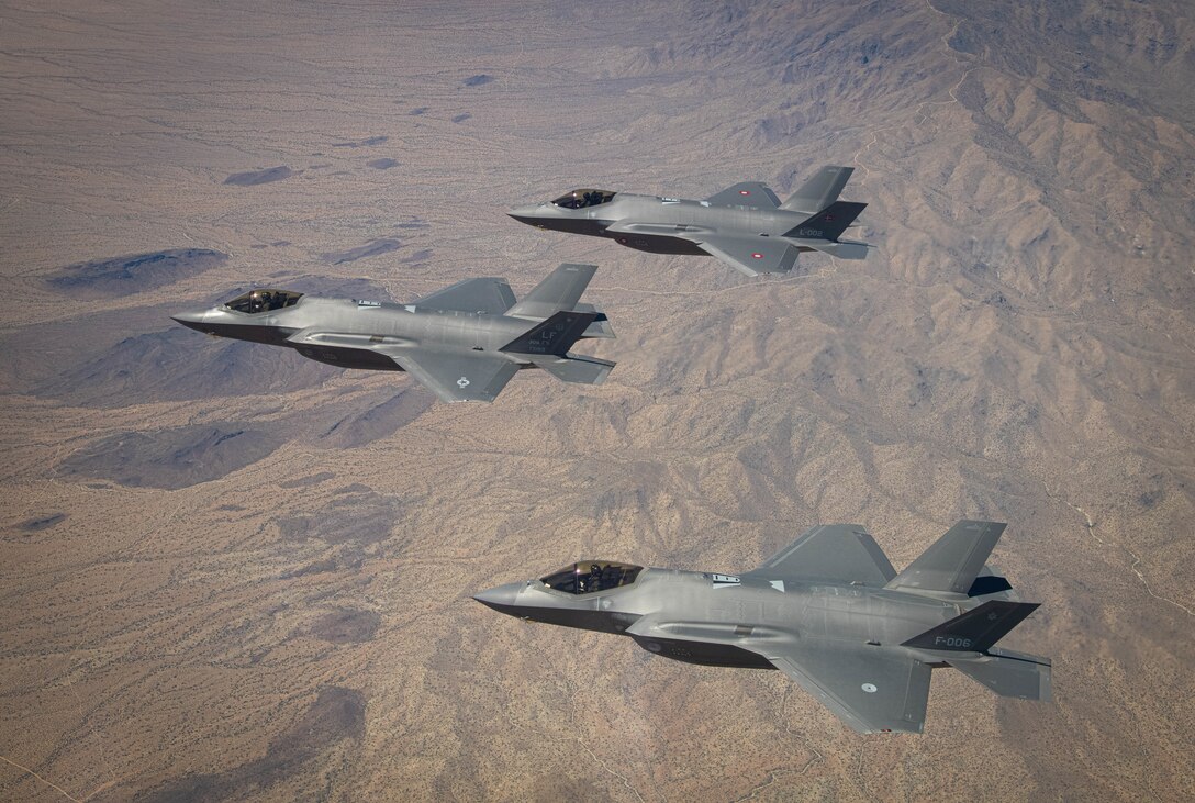 U.S. Air Force, Royal Danish Air Force and Royal Netherlands Air Force F-35A Lightning II fighter jets assigned to the 308th Fighter Squadron, Luke Air Force Base, Arizona, fly in formation May 5, 2021, over Bagdad, Arizona.