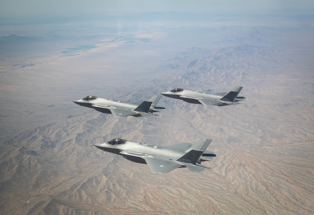 U.S. Air Force, Royal Danish Air Force and Royal Netherlands Air Force F-35A Lightning II fighter jets assigned to the 308th Fighter Squadron, Luke Air Force Base, Arizona, fly in formation May 5, 2021, over Bagdad, Arizona.