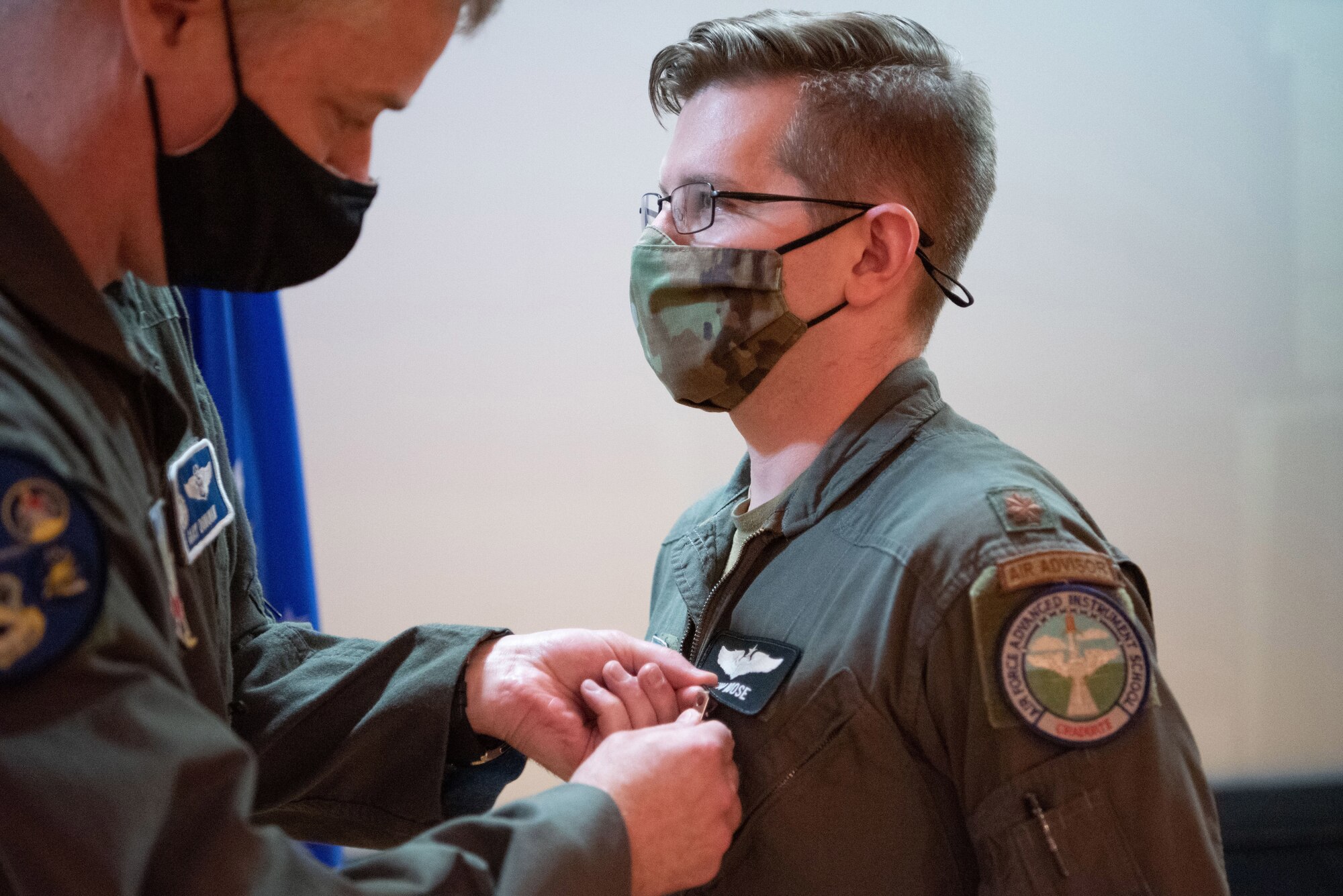 Airman getting pinned by another