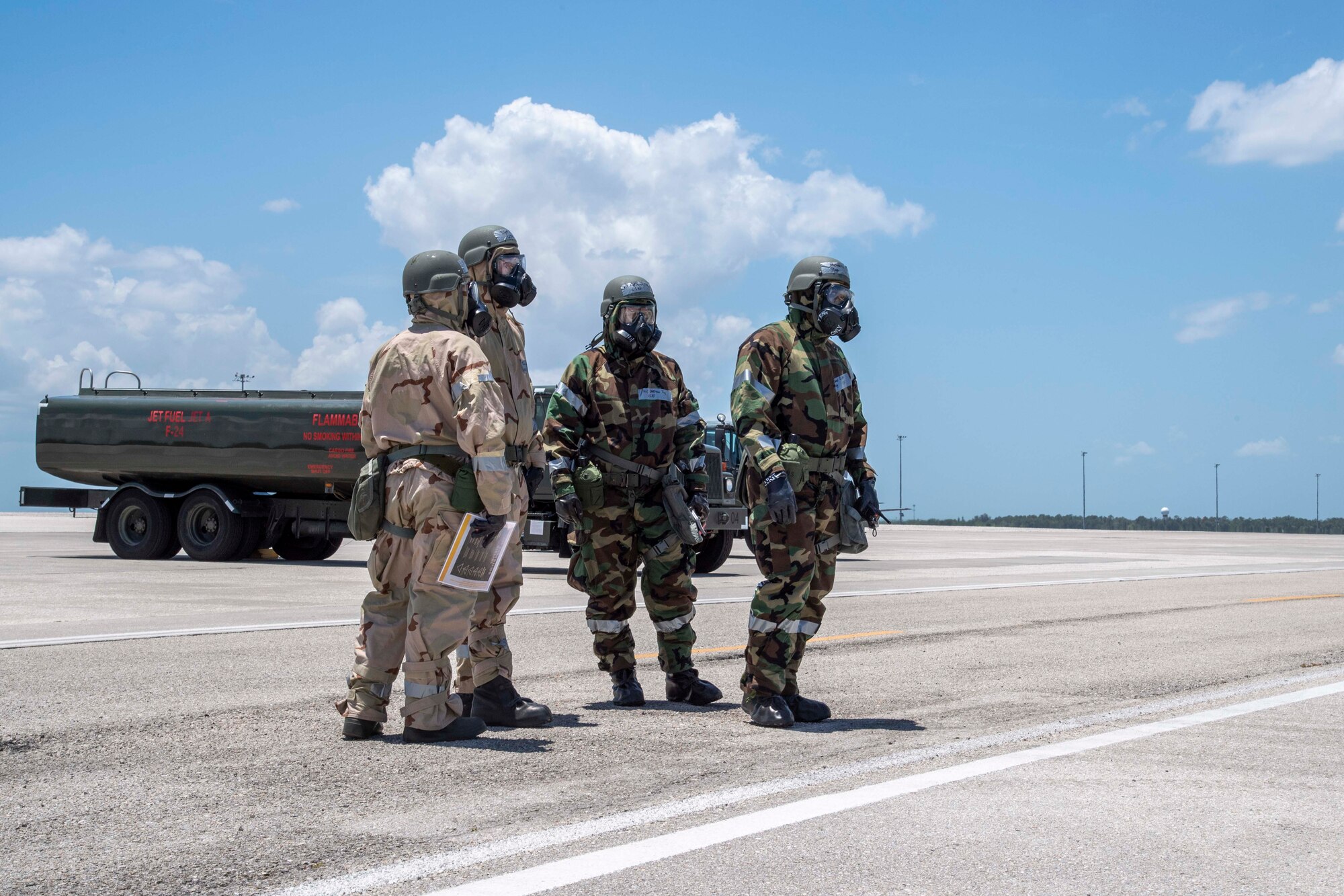 U.S. Air Force Airmen from the 6th Logistics Readiness Squadron perform a post-attack reconnaissance (PAR) sweep at MacDill Air Force Base, Florida, during a large-scale readiness exercise (LRE), May 19, 2021. PAR sweeps are a vital part of phase two of the LRE in order to ensure sustainment. (U.S. Air Force photo by Airman 1st Class Hiram Martinez)