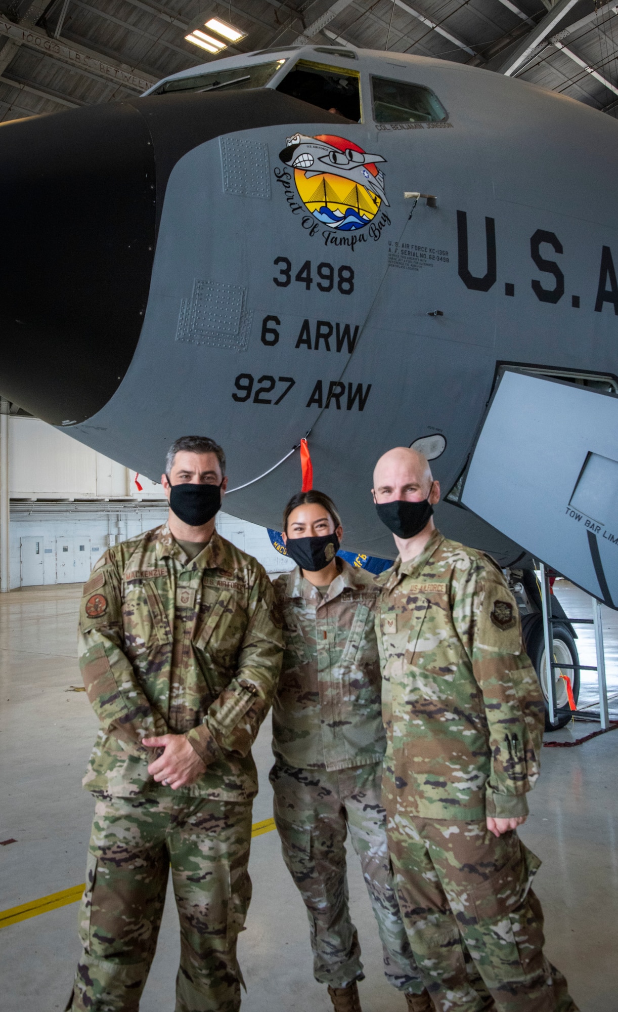 Airmen with the 6th Maintenance Group and 6th Air Refueling Wing pose for a picture during a nose art unveiling ceremony, May 3, 2021, at MacDill Air Force Base, Florida.