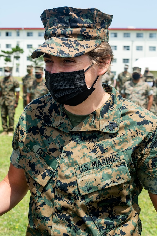 U.S. Marine Corps Sgt. Kaley Gee, the Marine Air Ground Task Force planning specialist chief and training non-commissioned officer with the 31st Marine Expeditionary Unit (MEU), Command Element, receives a meritorious promotion on Camp Hansen, Okinawa, Japan, May 2, 2021. The 31st MEU, the Marine Corps’ only continuously forward-deployed MEU, provides a flexible and lethal force ready to perform a wide range of military operations as the premier crisis response force in the Indo-Pacific region. (U.S. Marine Corps photo by Cpl. Alexandria Nowell)
