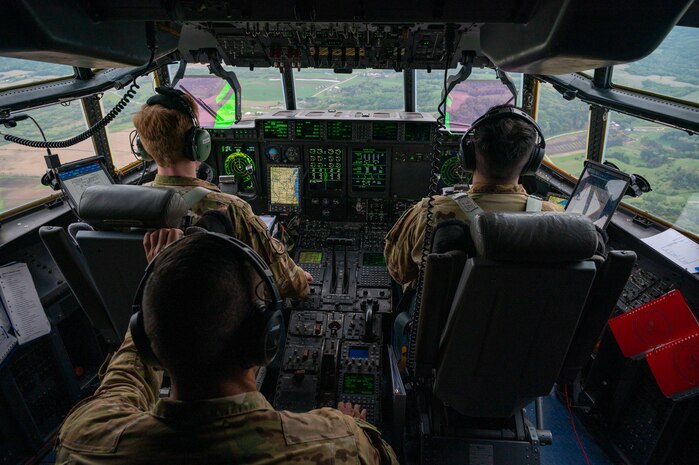 Pilots from the 39th and 40th Airlift Squadrons fly a C-130J Super Hercules over Volk Field Air National Guard Base, Wisconsin, May 20, 2021. Mobility Guardian incorporates 1,500 personnel across the joint force and the robust integration of 18 mobility aircraft fighters, bombers, special operations forces and field artillery, dispersed in 6 locations simulating geographically-diverse operating locations to conduct all-domain operations against a highly-capable adversary. (U.S. Air Force photo by Senior Airman Aaron Irvin)