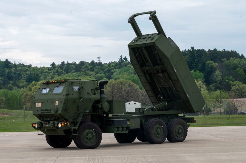 Soldiers assigned to 1st Battalion, 623rd Field Artillery Regiment, Kentucky Army National Guard, operate an M142 High Mobility Artillery Rocket System at Volk Field Air National Guard Base, Wisconsin, May 20, 2021. The HIMARS is a wheeled, all-terrain weather precision fire support system that provides strategic, long-range precision fires for a joint force. (U.S. Air Force photo by Senior Airman Aaron Irvin)