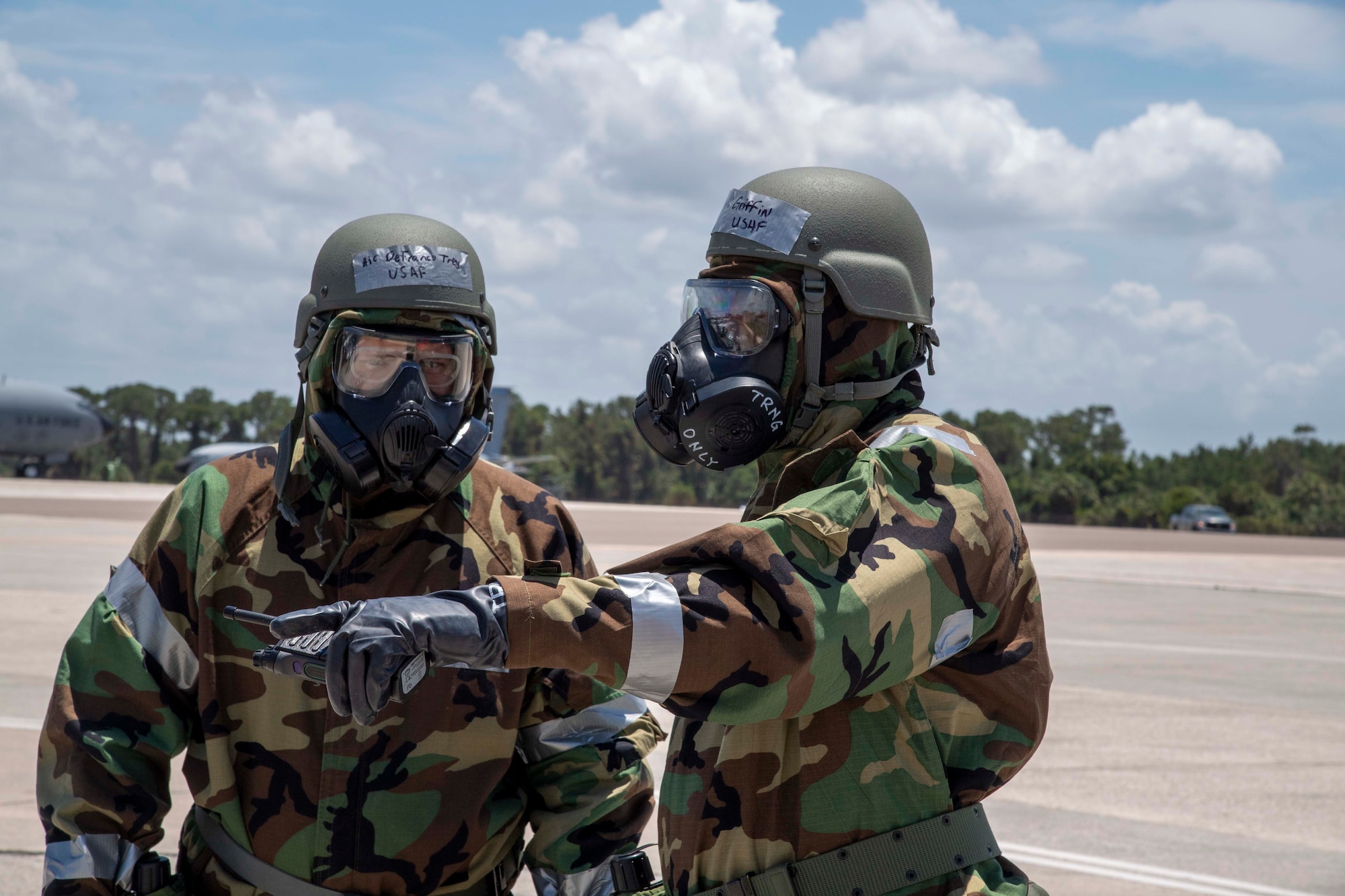 U.S. Air Force Airmen from the 6th Logistics Readiness Squadron perform a post-attack reconnaissance (PAR) sweep at MacDill Air Force Base, Florida, during a large-scale readiness exercise, May 19, 2021. PAR sweeps assess any damages caused by enemy opposition to help commanders make decisions on protective postures and recovery actions. (U.S. Air Force photo by Airman 1st Class Hiram Martinez)