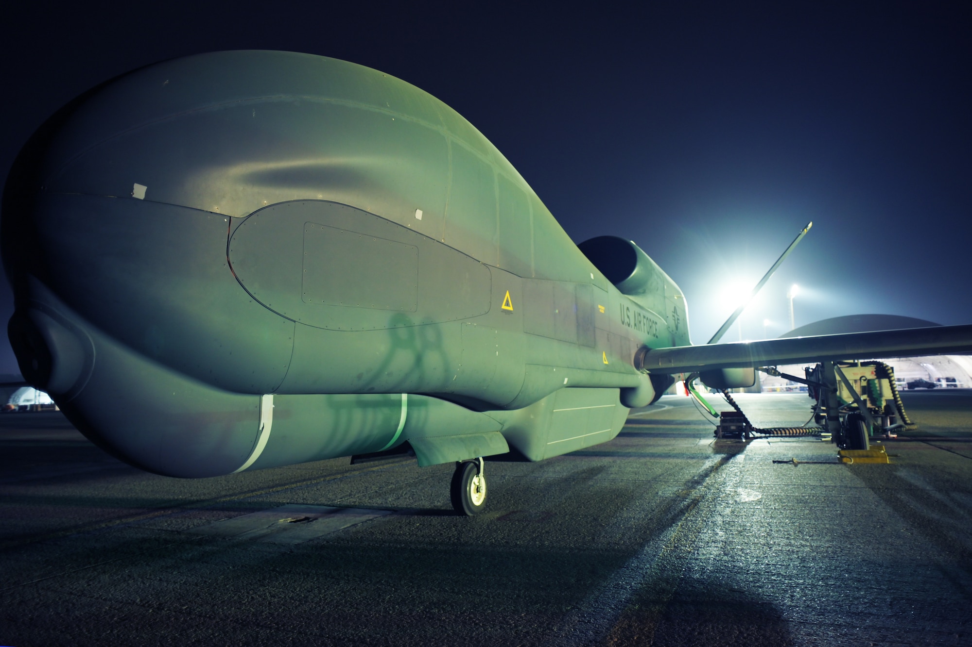 A U.S. Air Force Airmen from the 380th Expeditionary Aircraft Maintenance Squadron, prepare to launch an RQ-4 Global Hawk at Al Dhafra Air Base, United Arab Emirates, May 7, 2021, 2021. The Global Hawk’s mission is to provide a broad spectrum of intelligence, surveillance, and reconnaissance capabilities to support joint combatant forces. (U.S. Air Force photo by Staff Sgt. Jao'Torey Johnson)