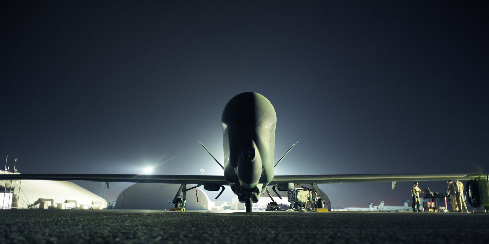 A U.S. Air Force Airmen from the 380th Expeditionary Aircraft Maintenance Squadron, prepare to launch an RQ-4 Global Hawk at Al Dhafra Air Base, United Arab Emirates, May 7, 2021, 2021. The Global Hawk’s mission is to provide a broad spectrum of intelligence, surveillance, and reconnaissance capabilities to support joint combatant forces. (U.S. Air Force photo by Staff Sgt. Jao'Torey Johnson)