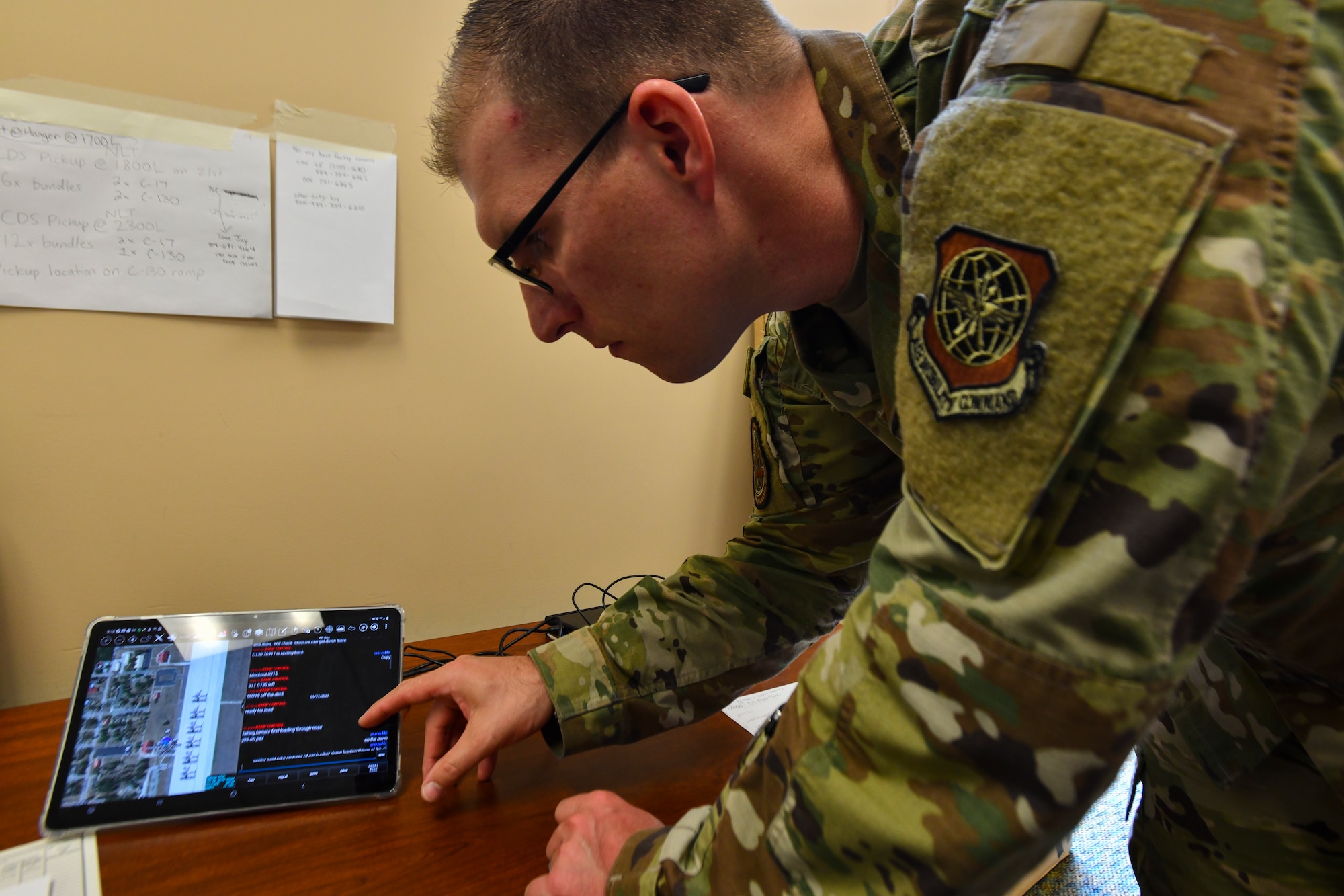 U.S. Air Force Tech. Sgt. Travis Alton, an Air Mobility Command command manager for Transportation Innovations, Systems and Futures, explains how to use the Android Team Logistics Awareness Switch during Exercise Mobility Guardian 2021 at the Alpena Combat Readiness Training Center, Michigan, May 21, 2021. AMC is collaborating with the Air Force Research Laboratory to modernize the logistics force, developing digitally-adept Airmen by updating processes which have remained largely unchanged for more than a decade. (U.S. Air Force video by Tech. Sgt. Kentavist P. Brackin)