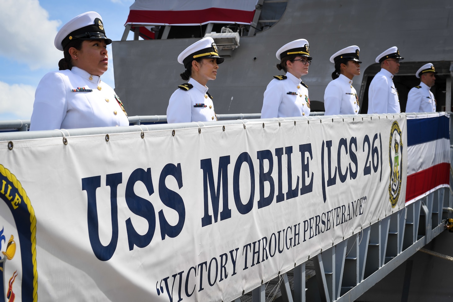 he crew of USS Mobile (LCS 26), man the ship during the commissioning ceremony of Mobile. Mobile is the Navy’s 13th Independence-variant littoral combat ship.