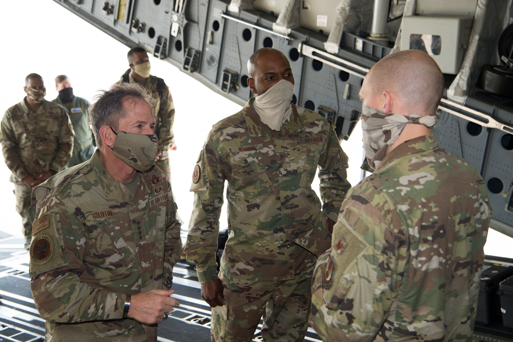 Air Force Chief of Staff Gen. David L. Goldfein listens to a brief by Lt. Col. Paul Hendrickson, Agile Combat Support Directorate's AF Chemical, Biological, Radiological, and Nuclear Defense Systems Branch materiel leader, about the rapid acquisition process and functional capabilities of a Negatively Pressurized Conex prototype at Joint Base Charleston, S.C., April 30, 2020. The NPC was developed and designed to fit inside both C-5 and C-17 aircraft to enable safe transport of up to 28 passengers, as well as teams of medical professionals to medical facilities around the globe. (U.S. Air Force photo by Staff Sgt. Chris Drzazgowski)