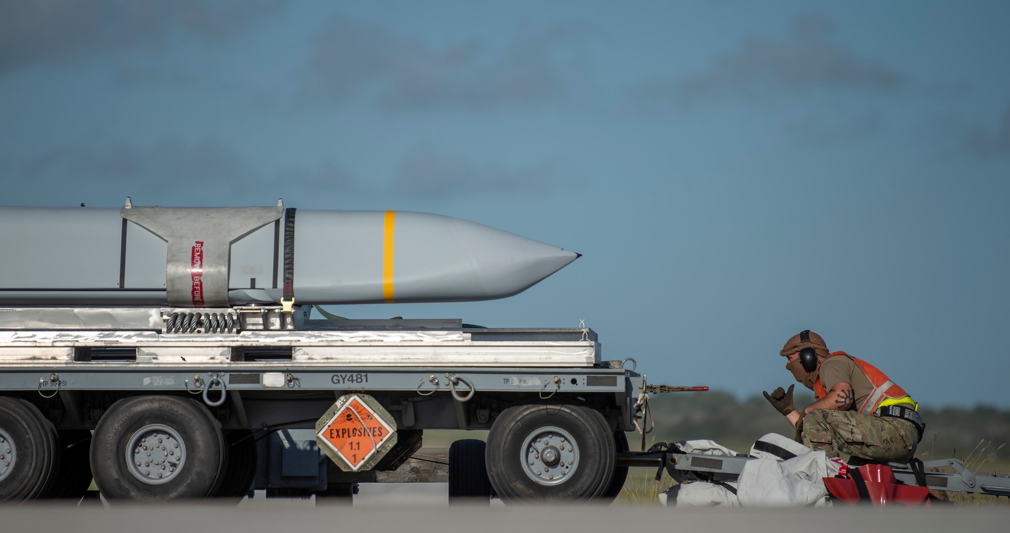 Staff Sgt. Zakk Bunting, 9th Expeditionary Bomb Squadron Aircraft Maintenance Unit  weapons load crew member, prepares to load a joint air-to-surface standoff missile into a B-1B Lancer on the flightline at Anderson Air Force Base, Guam, May 9, 2020. The B-1B can carry more than 74,000 lbs of munitions, which is the largest payload in the Air Force inventory. (U.S. Air Force photo by Senior Airman River Bruce)