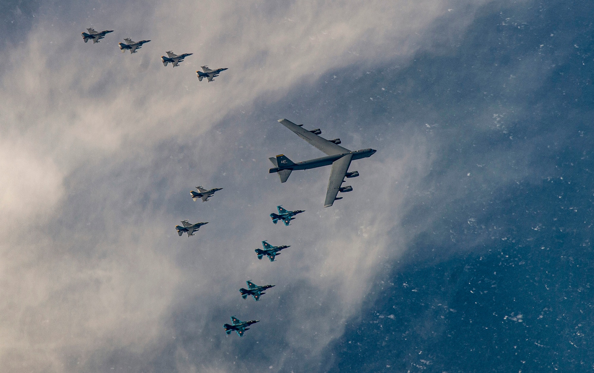 A U.S. Air Force B-52H Stratofortress from Minot Air Force Base, North Dakota, and six F-16 Fighting Falcons from Misawa Air Base, Japan, conduct bilateral joint training with four Japan Air Self-Defense Force F-2's off the coast of Northern Japan, Feb. 4, 2020. U.S. Strategic Command’s bomber forces regularly conduct combined theater security cooperation engagements with allies and partners, demonstrating U.S. capability to command, control and conduct bomber missions around the world. (U.S. Air Force photo by Staff Sgt. Melanie A. Bulow-Gonterman)