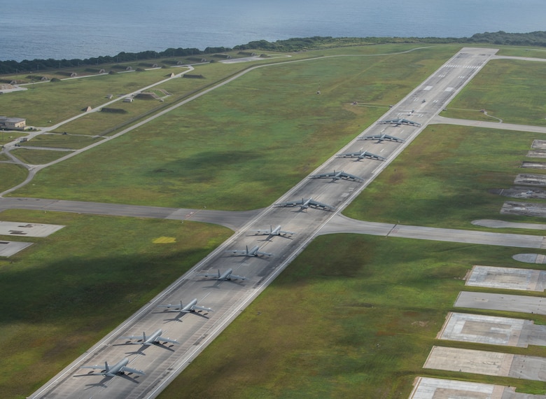 A U.S. Navy MH-60S Knighthawk, U.S. Air Force RQ-4 Global Hawk, Navy MQ-4C Triton, Air Force B-52 Stratofortresses, and KC-135 Stratotankers stationed at Andersen Air Force Base, Guam, perform an "Elephant Walk" April 13, 2020. The Elephant Walk showcases the 36th Wing's readiness and ability to generate combat airpower at a moment's notice to ensure regional stability throughout the Indo-Pacific. (U.S. Air Force photo by Senior Airman Michael S. Murphy)
