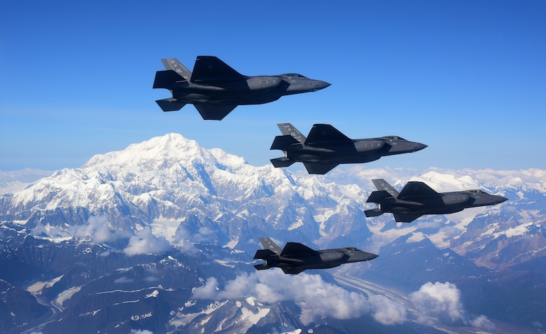Four F-35A Lightning IIs, assigned to the 388th Fighter Wing at Hill Air Force Base in Utah, fly in formation over Denali National Park, Alaska, Aug. 17, 2020. The 388th FW participated in RED FLAG-Alaska 20-3 during which fourth and fifth generation fighter aircraft trained side-by-side in the Joint Pacific Alaska Range Complex, the Department of Defense's largest instrumented training range. (U.S. Air Force photo by Tech. Sgt. Jerilyn Quintanilla)