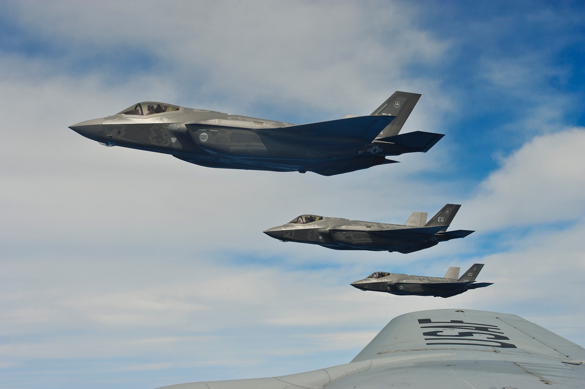 F-35A Lightning IIs, perform an aerial refueling mission with a KC-135 Stratotanker May 13, 2013, off the coast of northwest Florida. The 33rd Fighter Wing at Eglin Air Force Base, Fla., is a joint graduate flying and maintenance training wing that trains Air Force, Marine, Navy and international partner operators and maintainers of the F-35 Lightning II. The F-35As are assigned to the 58th Fighter Squadron, 33rd FW. The KC-135 is assigned to from the 336th Air Refueling Squadron from March ARB, Calif. (U.S. Air Force photo/ Master Sgt. Donald R. Allen)