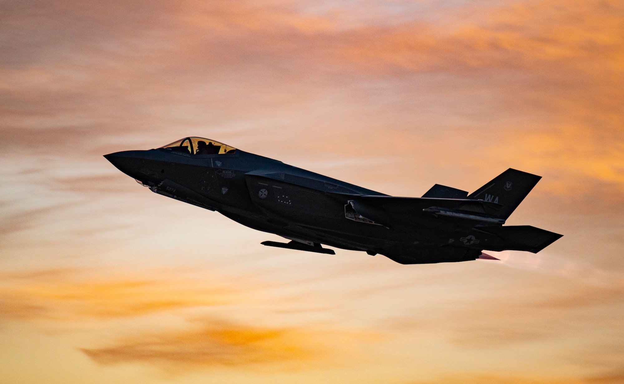 An F-35A Lightning II assigned to the 6th Weapons Squadron, U.S. Air Force Weapons School, takes off for a training mission at Nellis Air Force Base, Nev., Jan. 12, 2021. The school provides academic and advisory support to numerous units, enhancing air combat training for Airmen from the Air Force, Department of Defense and U.S. allied services each year. (U.S. Air Force photo by William R. Lewis)