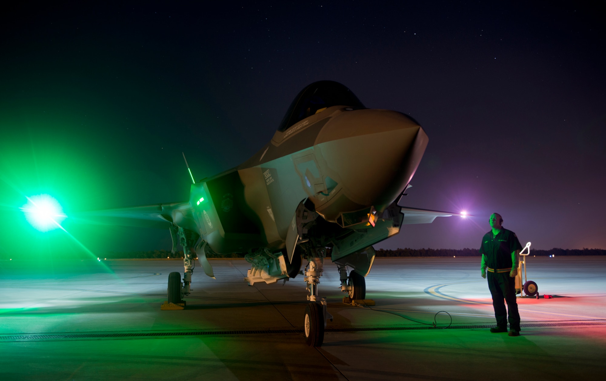 Staff Sgt. Bradley Anthis, a 58th Aircraft Maintenance Unit crew chief, monitors the F-35 Lightning II during a maintenance engine run at Eglin Air Force Base, Fla.(U.S. Air Force photo/Tech. Sgt. Bennie J. Davis III)