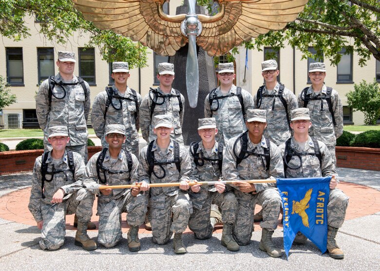 An Air Force Reserve Officer Training Corps flight poses for a photo following their graduation of field training, July 15, 2020, Maxwell Air Force Base, Alabama. Air Force ROTC cadets attend the two-week training here during the summer between their sophomore and junior years at college.