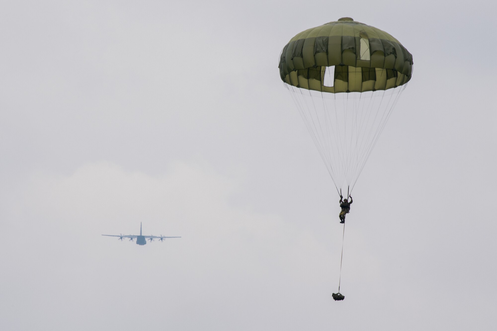 Japan Ground Self-Defense soldier parachutes from aircraft