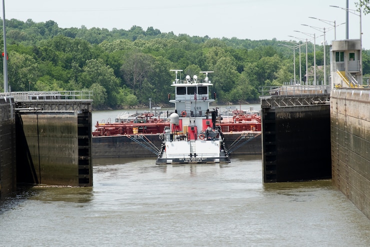 The Motor Vessel Galveston Bay out of Ashland, Kentucky, with empty Marathon Petroleum Company fuel barges, exits Cheatham Lock in Ashland City, Tennessee, May 21, 2021 headed downstream back to refineries in Texas. The U.S. Army Corps of Engineers Nashville District worked with the fuel industry and Regional Rivers Repair Fleet, which is performing maintenance at the lock, to schedule openings to accommodate the movement of fuel barges on the Cumberland River. (USACE Photo by Lee Roberts)