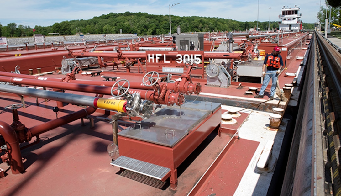 The Motor Vessel Tampa out of Ashland, Kentucky, moves Marathon Petroleum Company fuel barges May 21, 2021 through Cheatham Lock in Ashland City, Tennessee, headed to terminals in Nashville. The U.S. Army Corps of Engineers Nashville District worked with the fuel industry and Regional Rivers Repair Fleet, which is performing maintenance at the lock, to schedule openings to accommodate deliveries of fuel to Middle Tennessee. Each barge carries around 28,000 barrels of fuel. (USACE Photo by Lee Roberts)