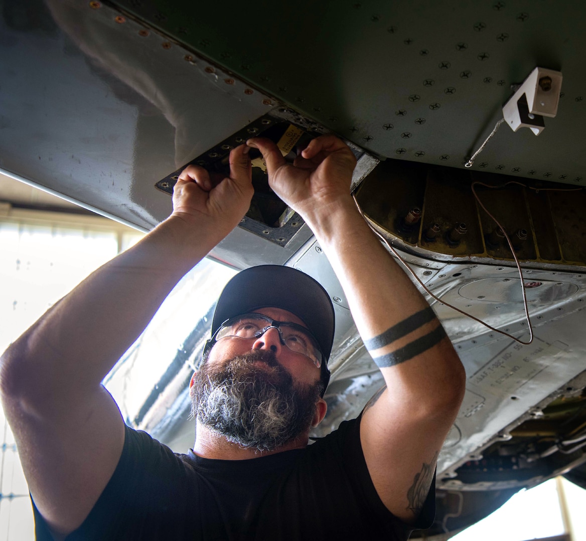 Man working on aircraft