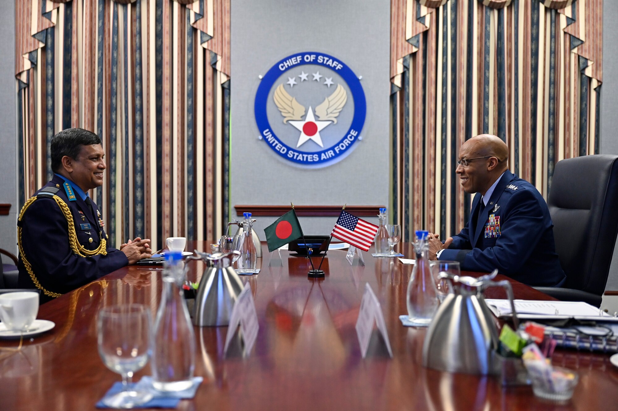 Air Force Chief of Staff Gen. Charles Q. Brown, Jr., right, meets Air Chief Marshal Masihuzzaman Sernibat, chief of the air staff for the Bangladesh Air Force.