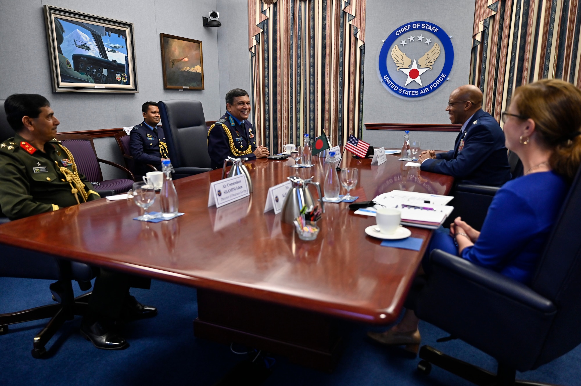 Air Force Chief of Staff Gen. Charles Q. Brown, Jr., center right, meets Air Chief Marshal Masihuzzaman Sernibat, chief of the air staff for the Bangladesh Air Force