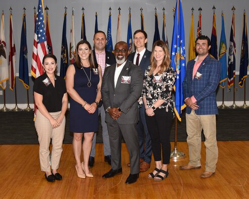 Honorary commanders pose with their unit commanders.