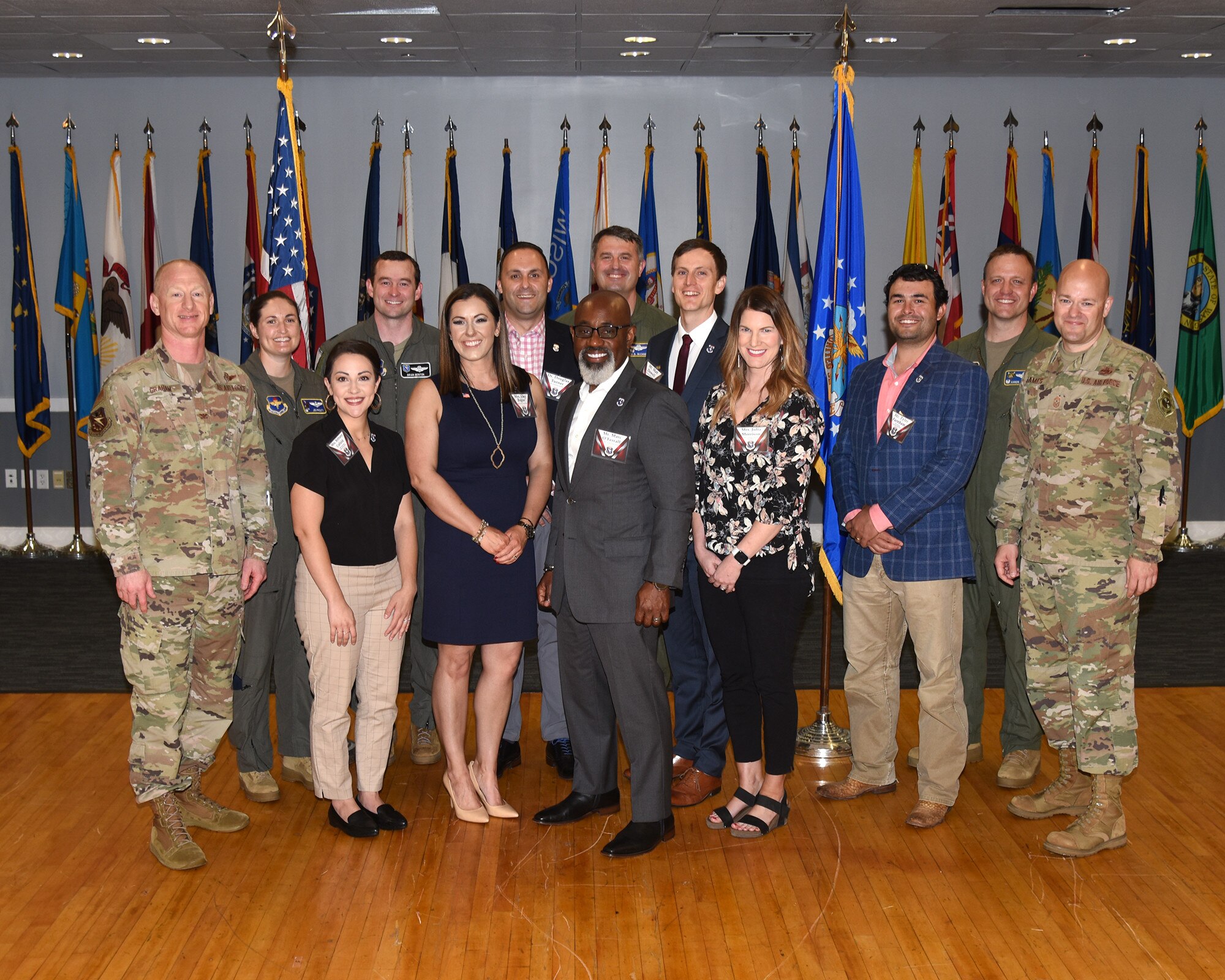 Honorary commanders pose with their unit commanders.