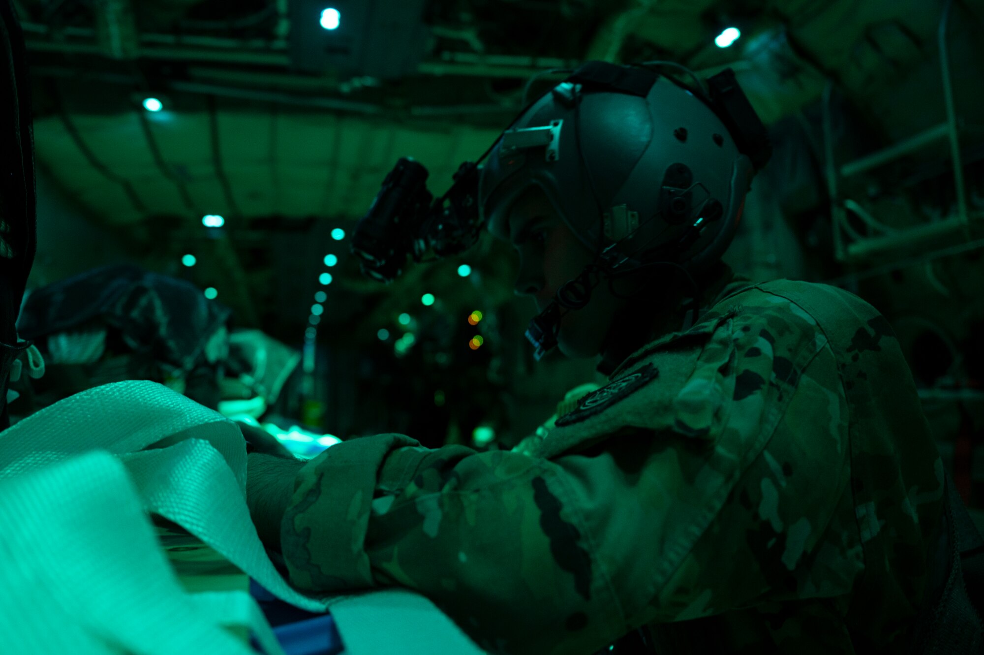 A loadmaster prepares an airdrop